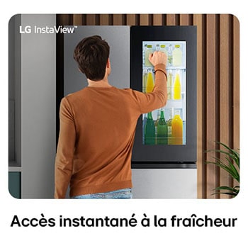Réfrigérateur Multi-Portes LG GMG960MBJE au fini acier inoxydable, présentant la technologie InstaView™ Door-in-Door® où une personne prend une boisson sans ouvrir le compartiment principal.