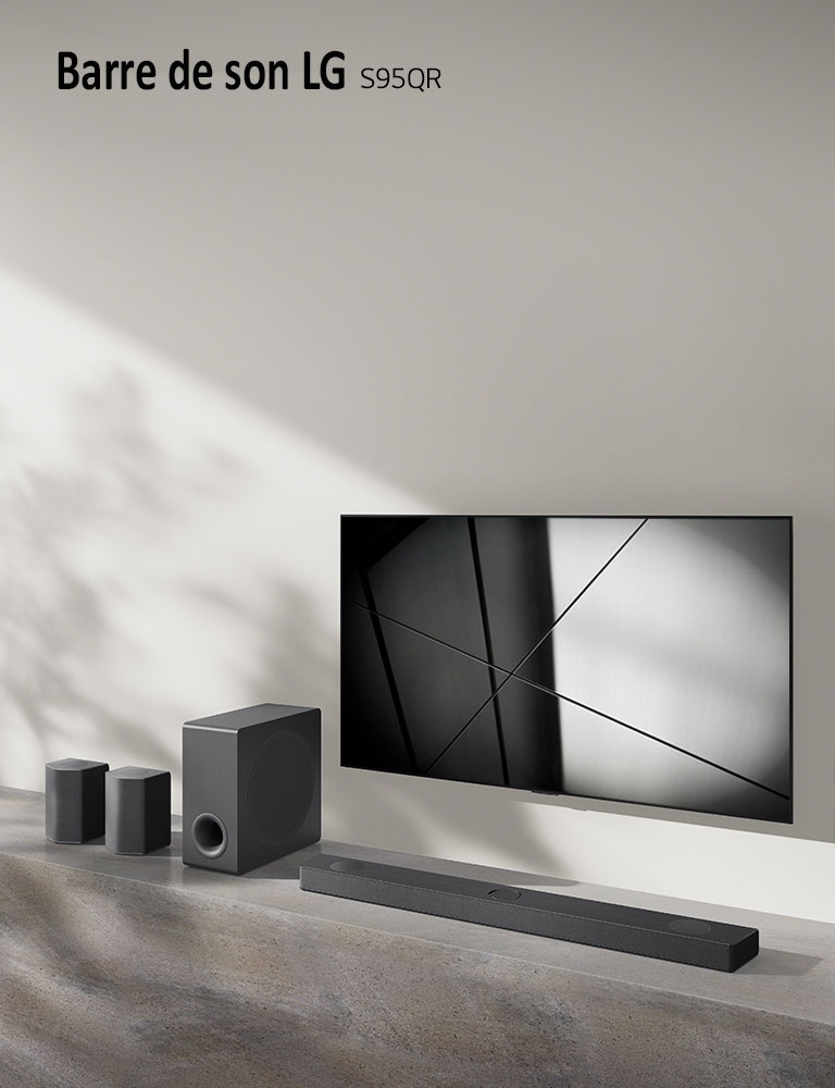 LG sound bar S80QR and LG TV are placed together in the living room. The TV is on, displaying a black and white image.