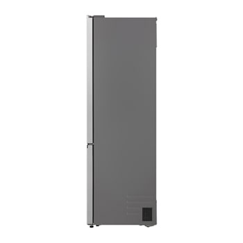 Réfrigérateur congélateur LG (gbbsj20dpy) intégré dans une armoire marron foncé avec fenêtre et canapé à gauche et évier à droite