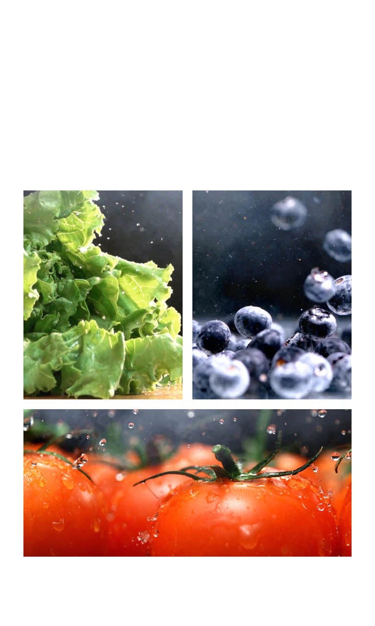 Laitue verte à gauche, tomate rouge au centre, myrtilles à droite, avec gouttes d'eau éclatantes.