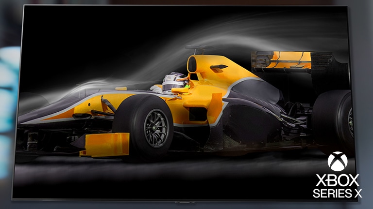 Une vue rapprochée d'un écran TV avec une voiture de course