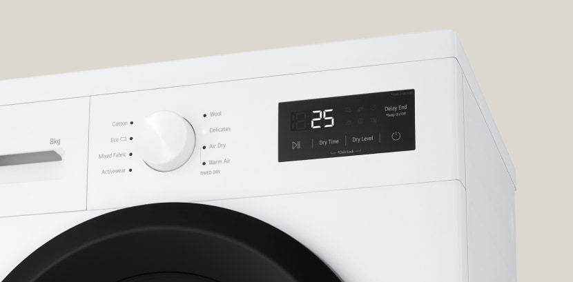 Gros plan sur le cadran et le panneau du sèche-linge