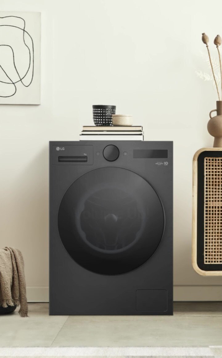Une vidéo montre un lave-linge LG et diverses mélodies de fin. La vidéo prend fin en montrant l’application LG ThinQ.