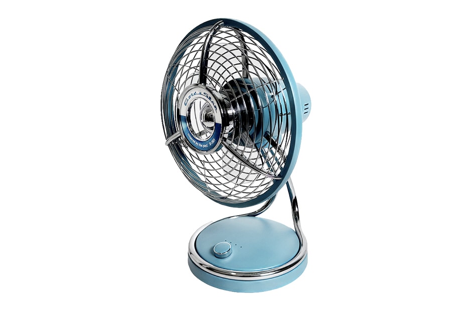 Side angled view of the heritage fan showing classic round base and slim profile Side angled view of the heritage fan showing classic round base and slim profile