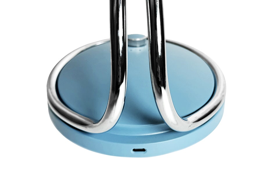 Close-up of the heritage fan's USB-C charging port at the base Close-up of the heritage fan's USB-C charging port at the base