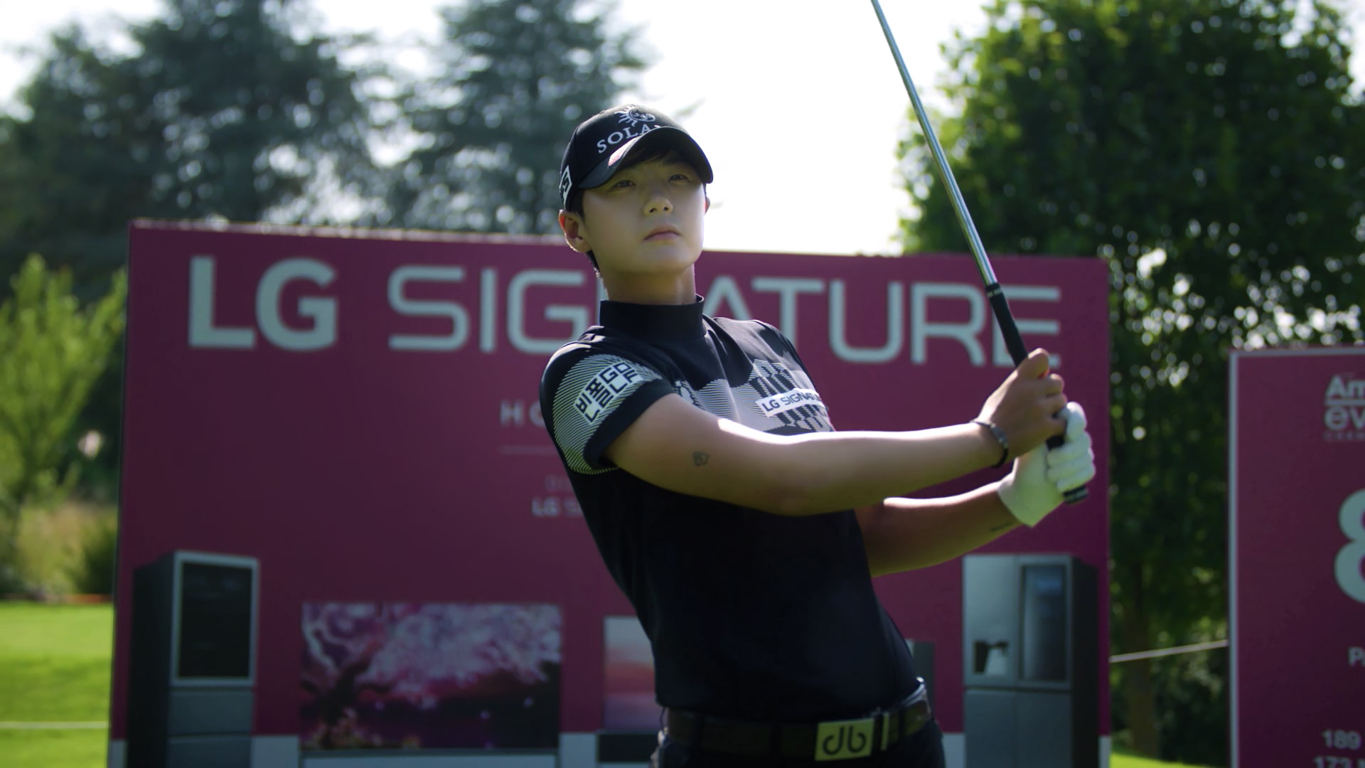 LG SIGNATURE brand ambassador Sung Hyun Park swings a golf club
