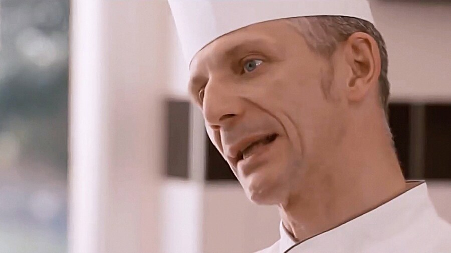 close up of chef who is talking something at the lg signature and evian championship event