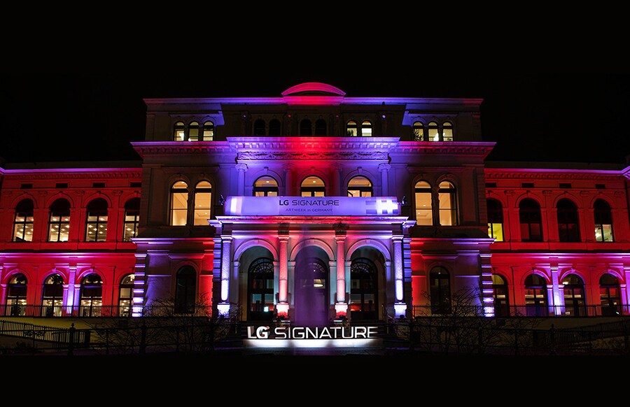 front view of building with the colorful lighting where lg signature artweek is being held in germany