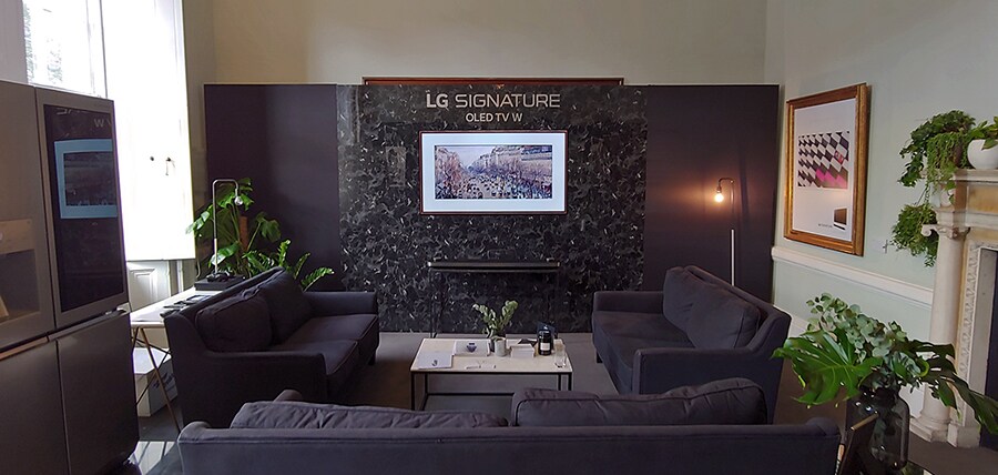 overall view of esquire townhouse offline event site with lg signature oled tv hung oh the right in the middle of the wall