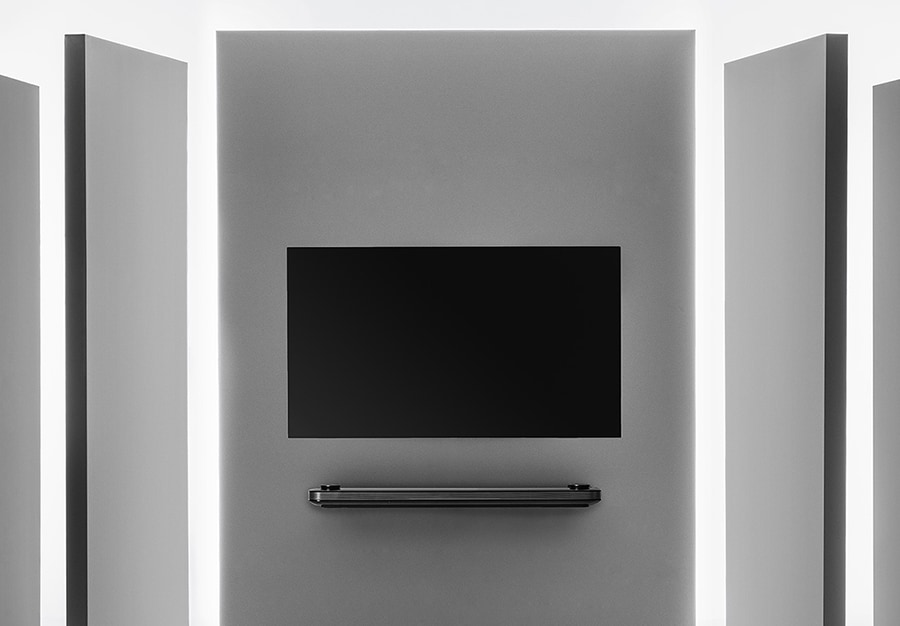 renolg signature oled tv w is hung on the walls that suit into theater concept