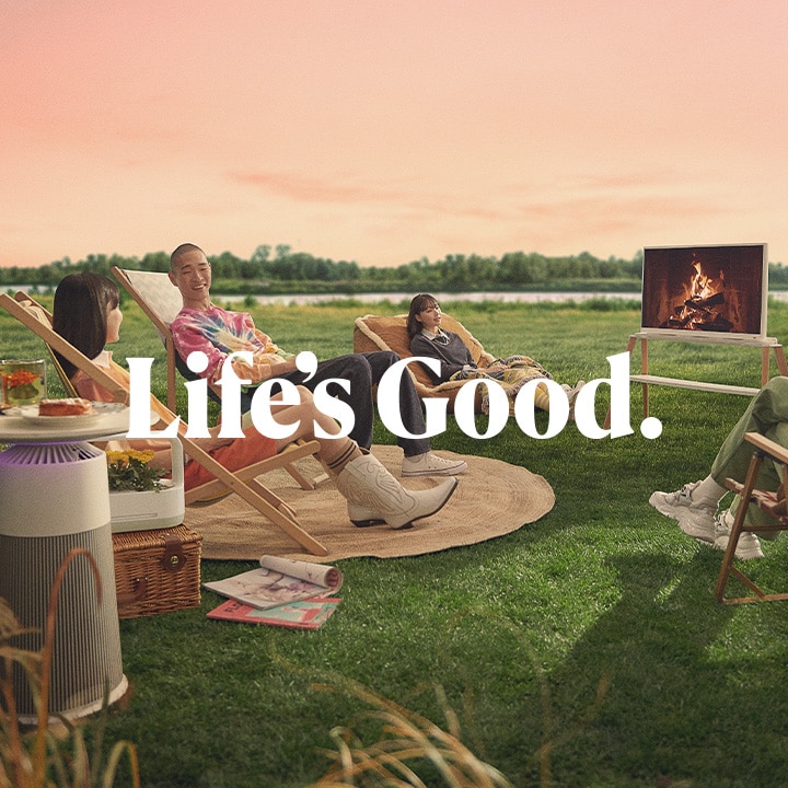 The image of the 'Life's Good' message floating amidst young people jumping in the air.