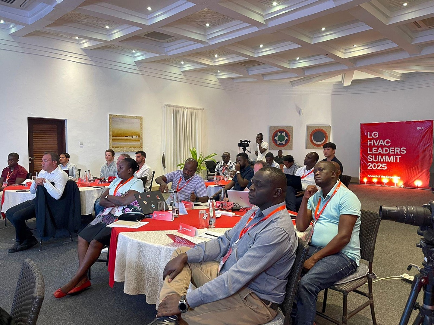 A photo of a crowd at a conference