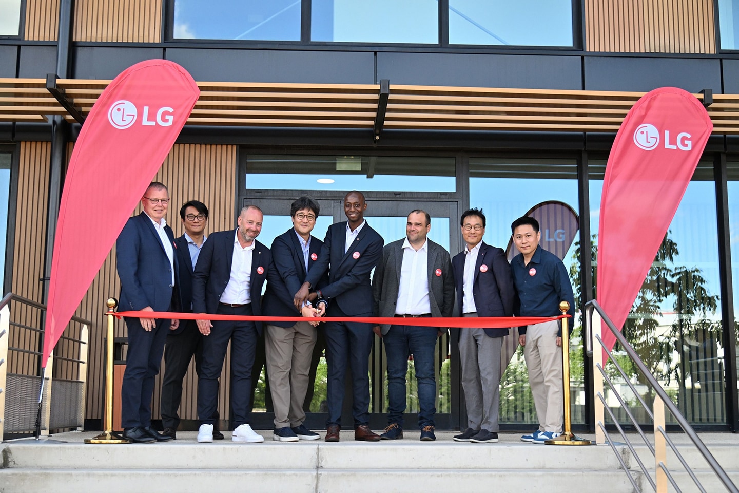 A photo of attendees participating in the opening ceremony of the LG HVAC Academy in Lyon, France