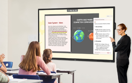 A teacher using LG CreateBoard’s 'Ask LG' feature to receive AI-driven answers and information as she teaches her class.