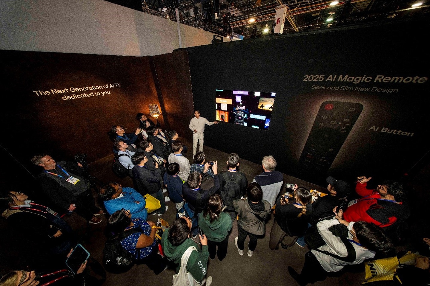 A photo of visitors listening to an explanation of the AI-powered Magic Remote at the Escape & Immerse zone