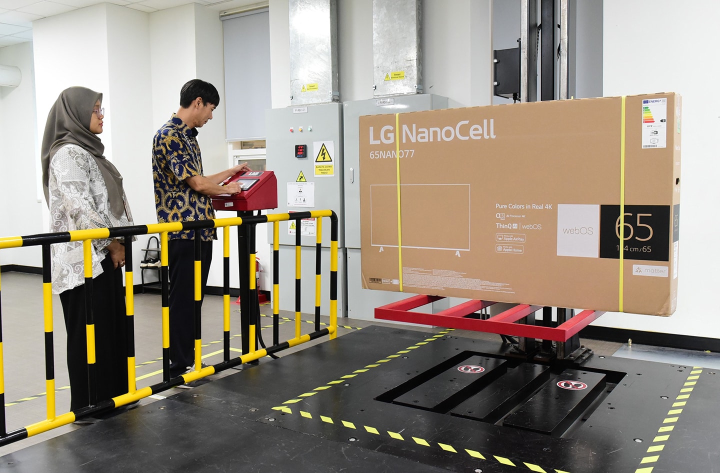 A picture of two people carrying out tests with products