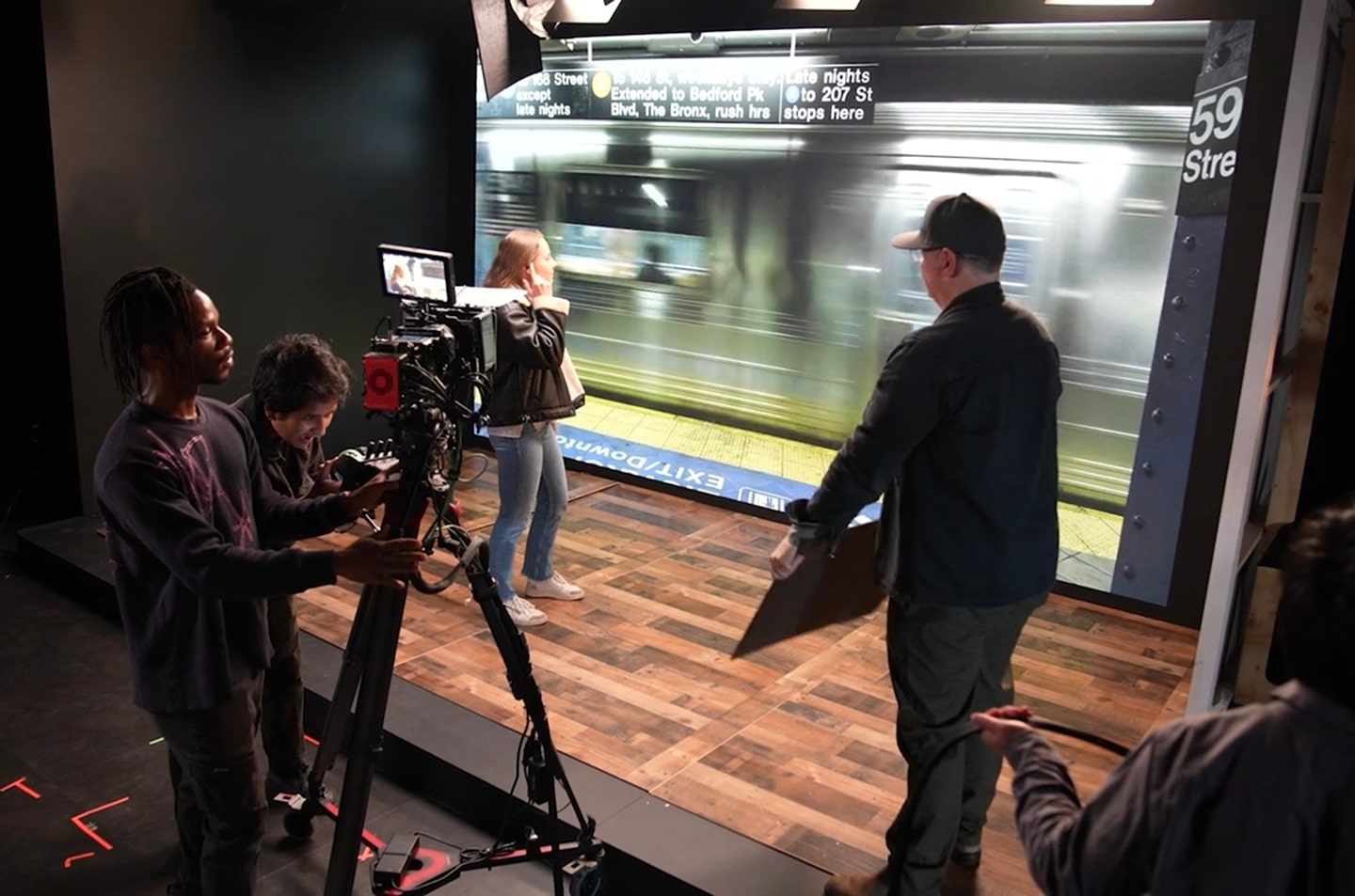 A photo of people busily working in LG Virtual Production Studio
