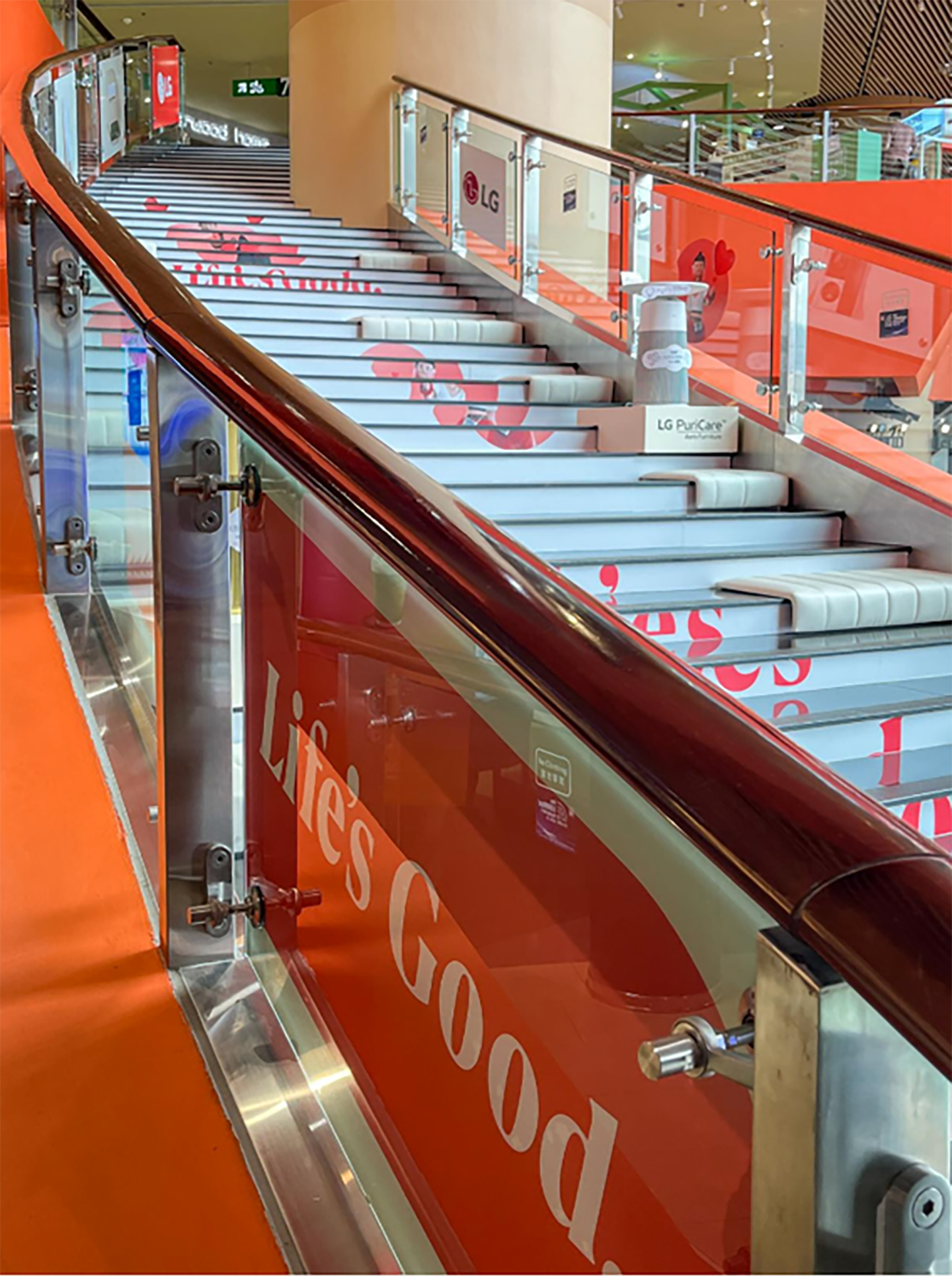 A picture of the showcasing stairway and the Life's Good slogan and logo on the stairway