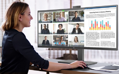 A picture of a woman using the LG ergonomic business monitor