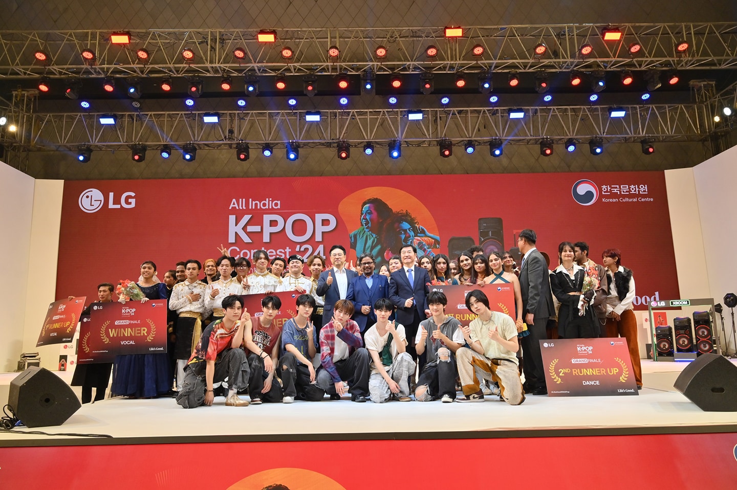 A photo of the winning teams of All India K-POP Contest 2024 gathered together for a photo