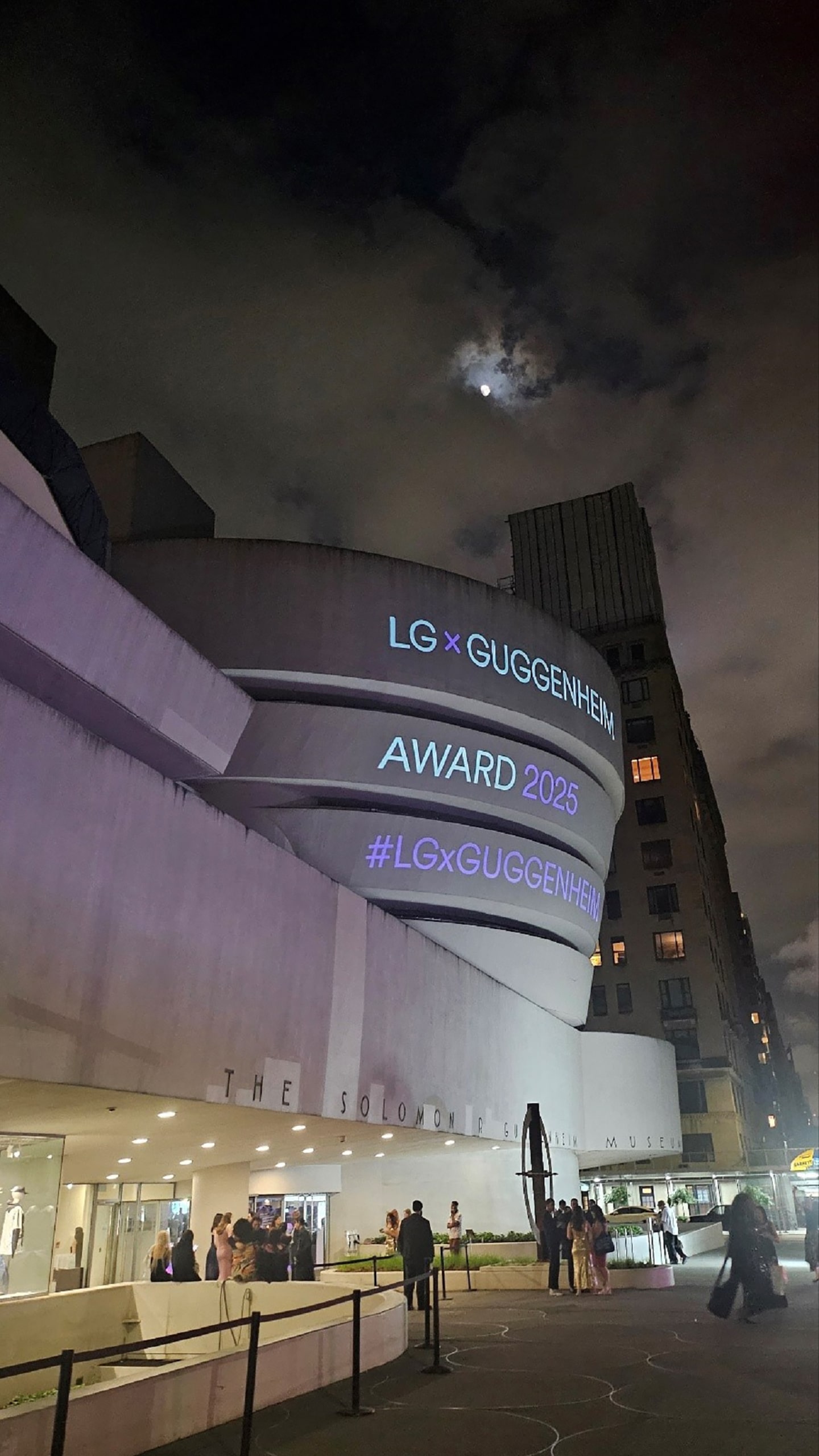 A photo of a building with a projection on written 'LG x Guggenheim Award 2025 #LGxGuggenheim'
