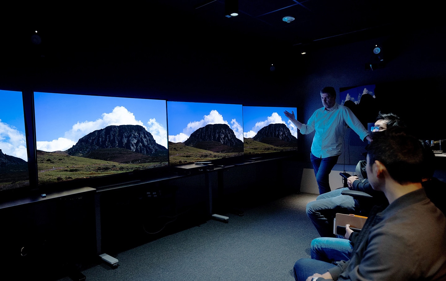 A picture of people looking at OLED screens