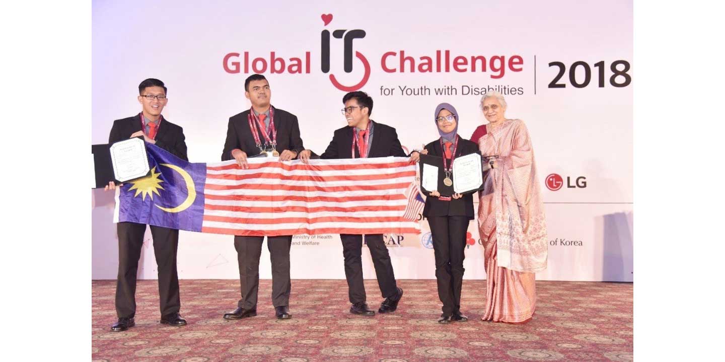 Challenge winners from Malaysia hold up their national flag and the award certificate.