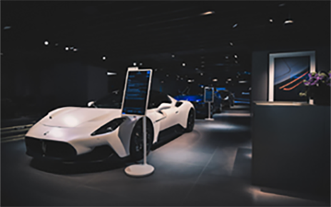 LG StanbyME installed next to the Maserati's luxurious automobile at Maserati showroom in Hong Kong