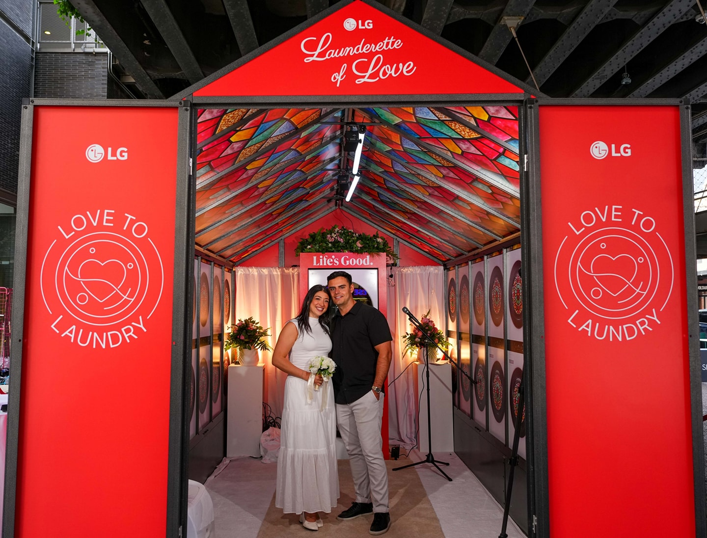 A photo of a couple standing inside a small built-in wedding venue