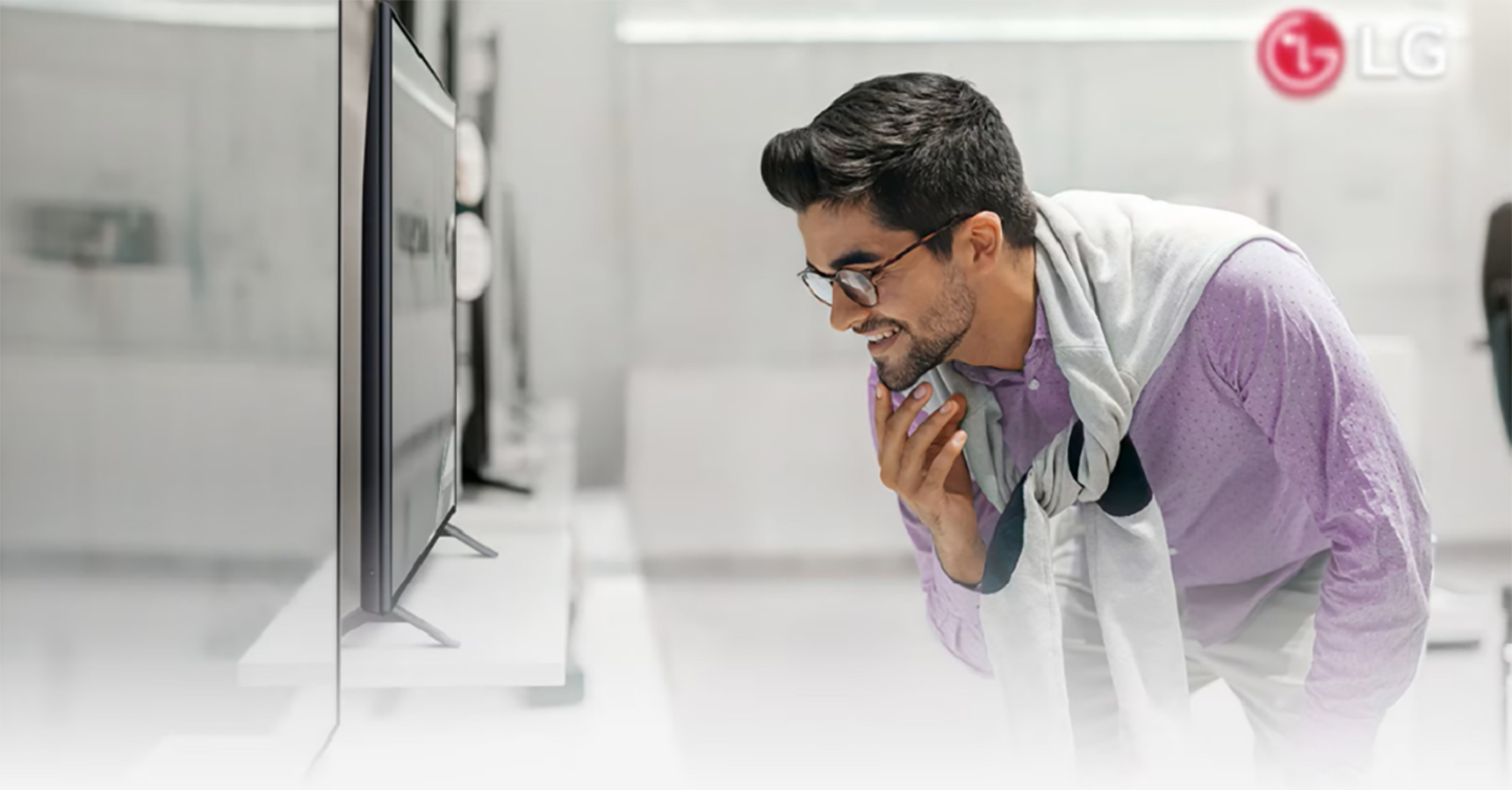 A picture of man looking at LG Electronics products at the shop 