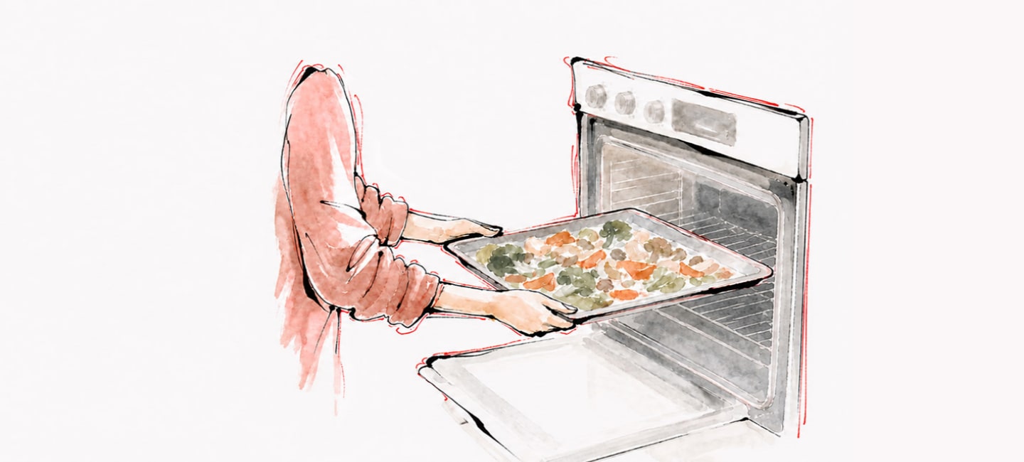 Watercolor and ink illustration on textured cream paper, wide horizontal crop, no text overlay. A close-up of two hands in a coral pink sleeve sliding a metal tray of mixed diced vegetables, including orange carrots and green peas, into an open oven with visible interior racks.