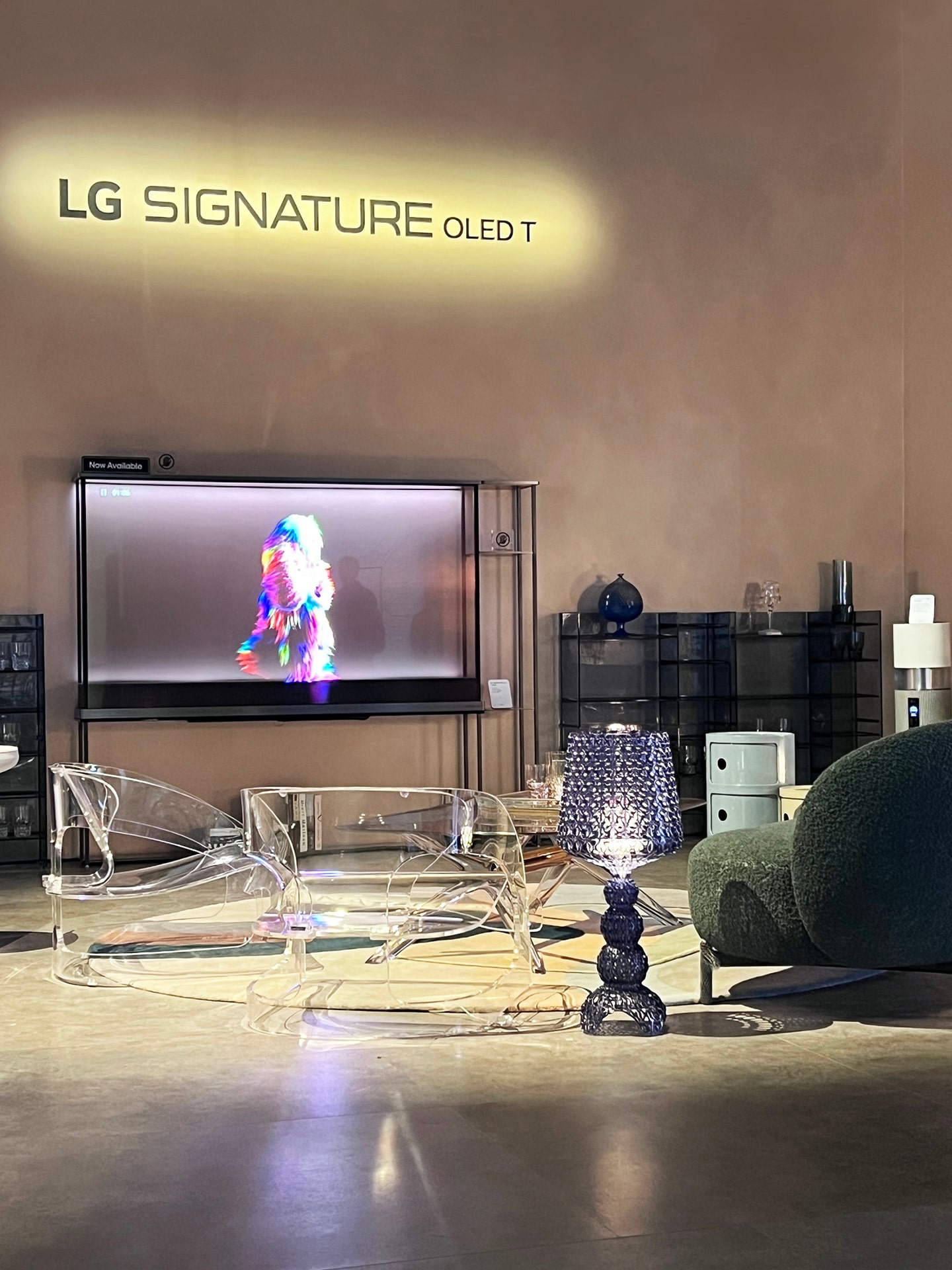 A picture of the showroom with Kartell products and LG Signature OLED T