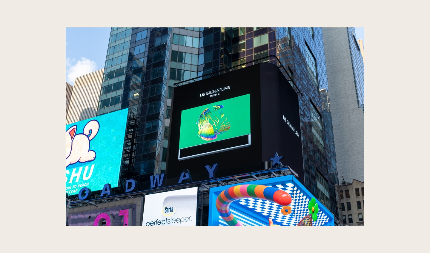LG's digital billboard in Time Square, New York displaying an animation for LG SIGNATURE OLED Z representing the infinite and rich color of the product