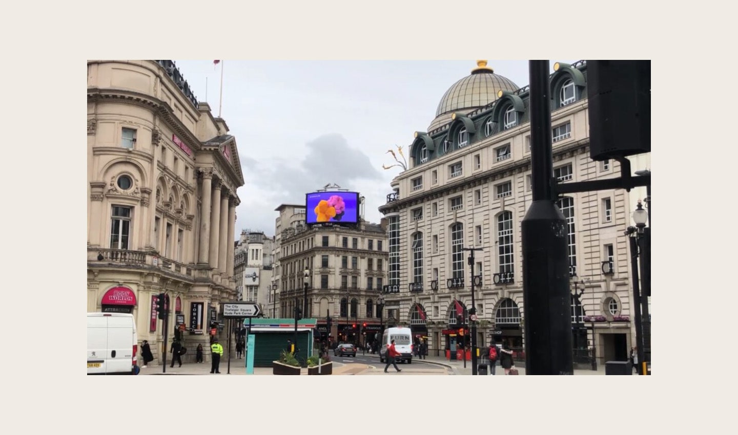 LG's digital billboard in Piccadilly Circus, London displaying an animation representing the function of LG SIGNATURE Washer and Dryer