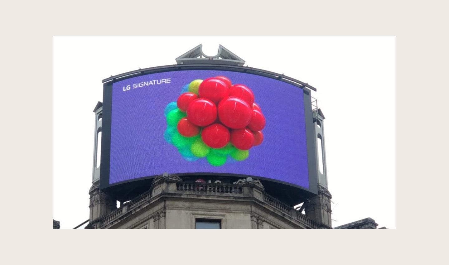 A close-up photo of LG's digital billboard in Piccadilly Circus, London with an animation representing LG SIGNATURE Wine Cellar