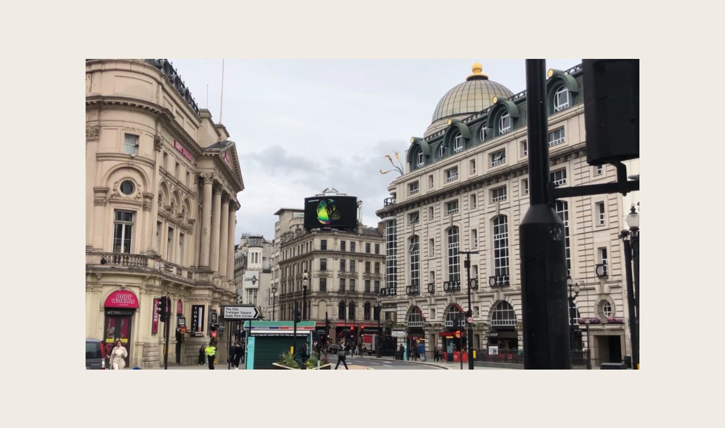 LG's digital billboard in Piccadilly Circus, London displaying an animation representing the function of LG SIGNATURE OLED R