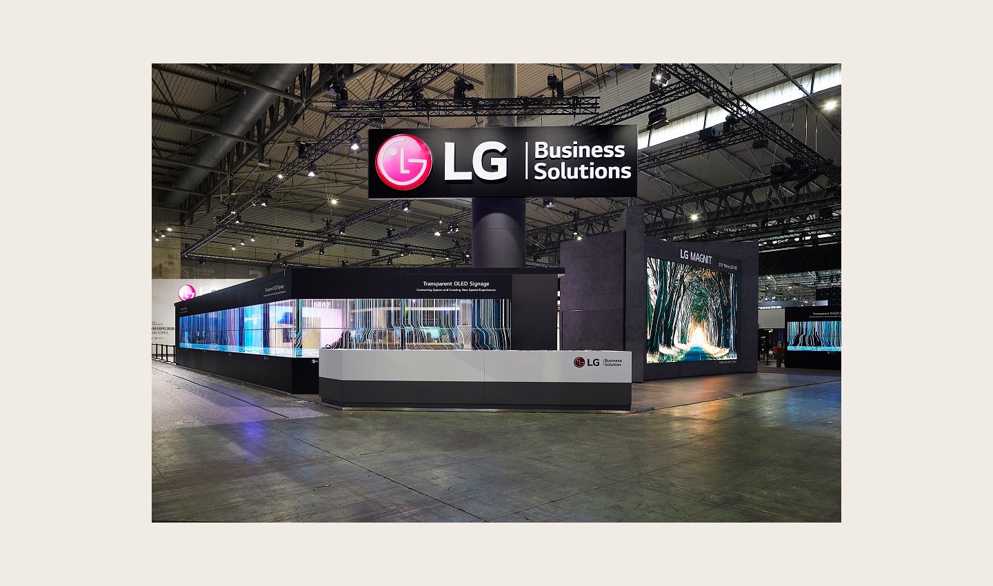 Transparent OLED Signage on display at LG's booth at ISE 2023, side angle