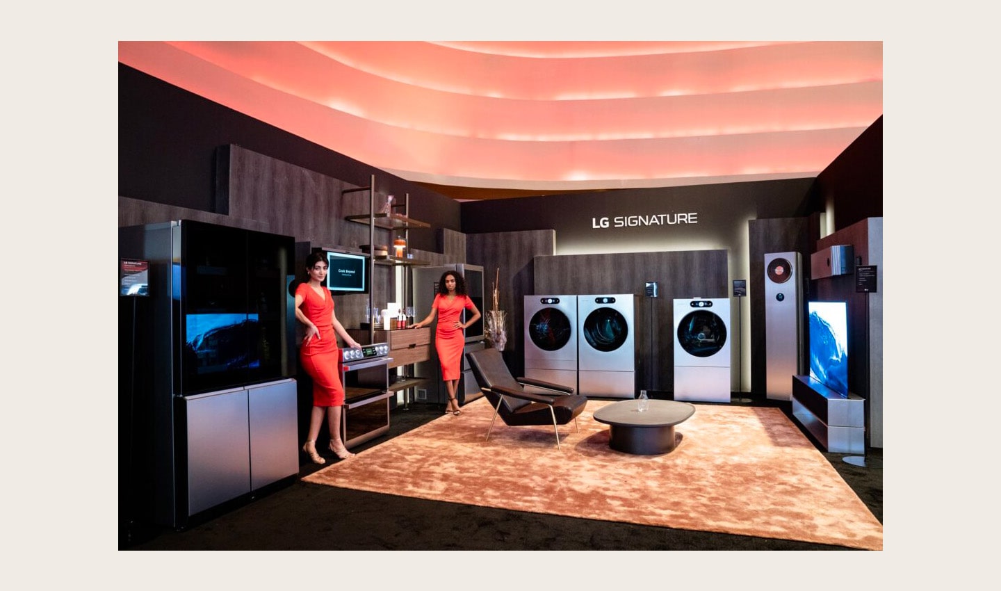 Two models posing with LG SIGNATURE appliances displayed at the renowned Middle East and Africa (MEA) tech event, LG Showcase 2023