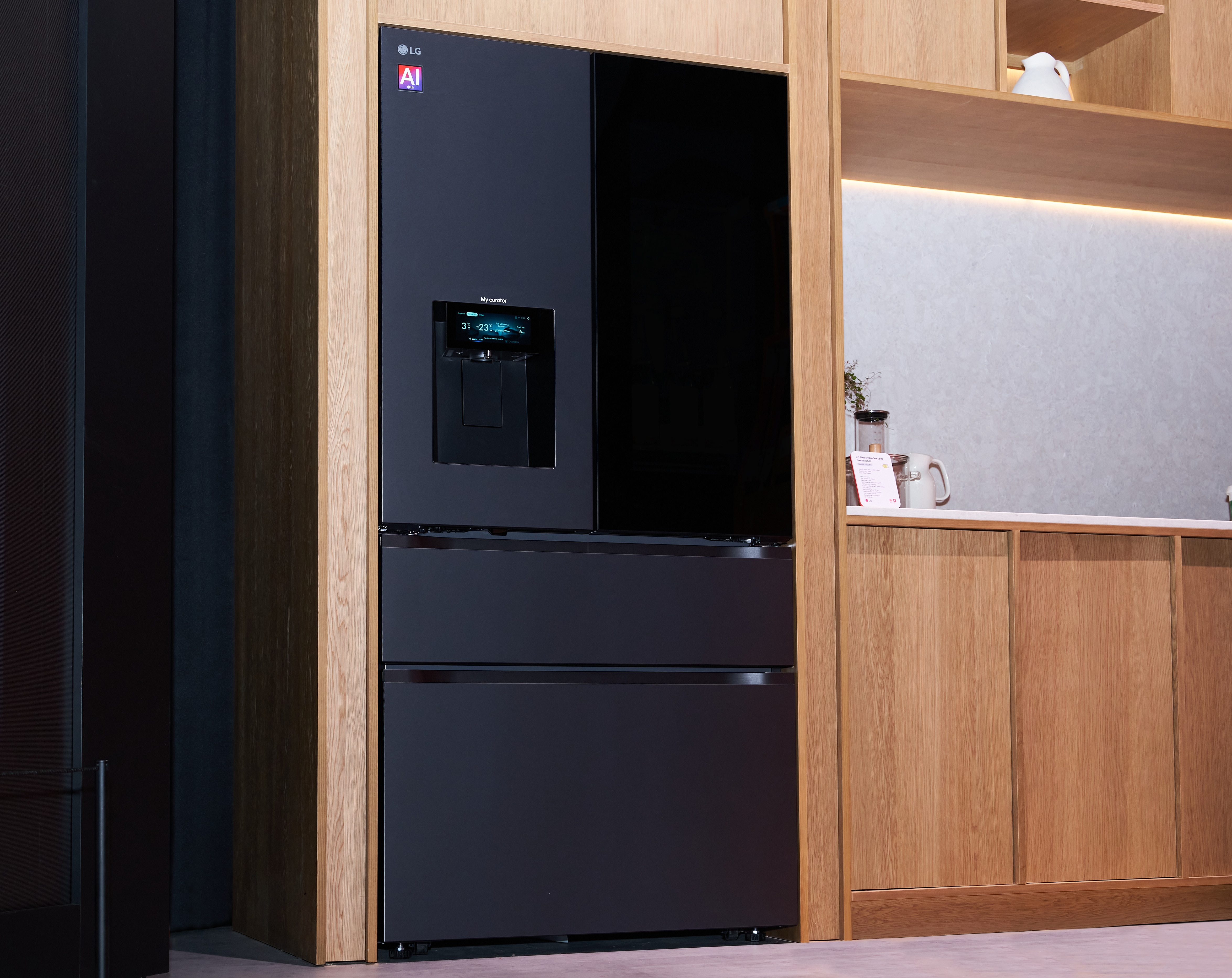 The space-conscious LG Fit & Max French-door refrigerator is exhibited at IFA 2026, featuring a dark finish, a new 6.8-inch LCD display, and a Zero Clearance design that enables a flush fit alongside cabinetry.
