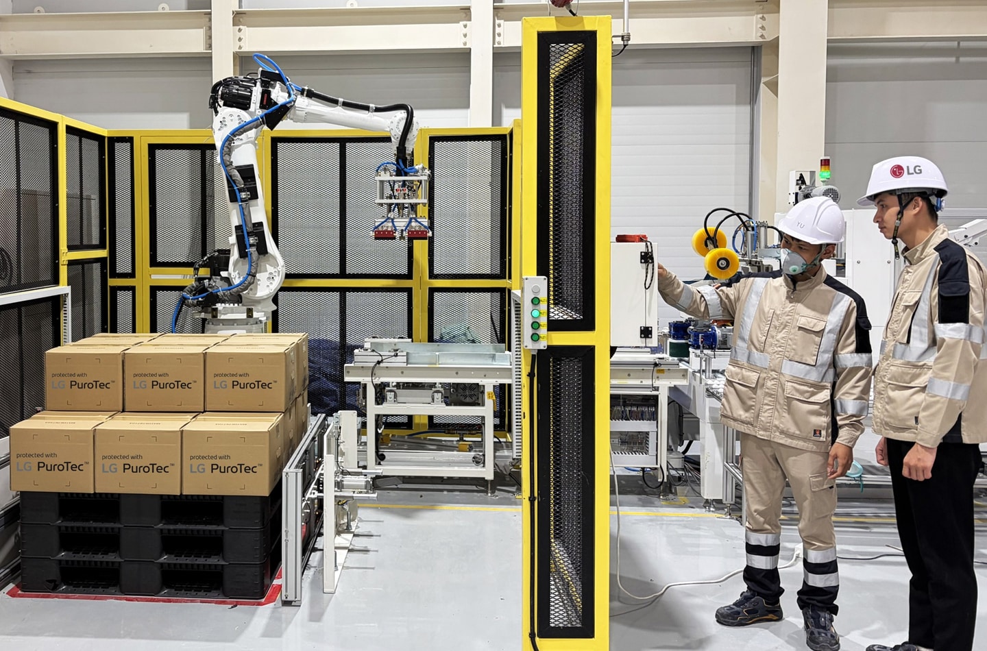 LG Electronics is strengthening its global supply chain for advanced glass powder-based materials with a new production line at its manufacturing facility in Haiphong, Vietnam, producing key materials including LG PuroTec™ and Easy-Clean Enamel. Image alt: LG Electronics employees inspect an automated production line at the company's advanced glass powder materials facility in Haiphong, Vietnam, where LG PuroTec™ products are being packaged for shipment.