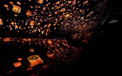 Attendees admiring the LG OLED Falls at the LG Booth at CES 2019.