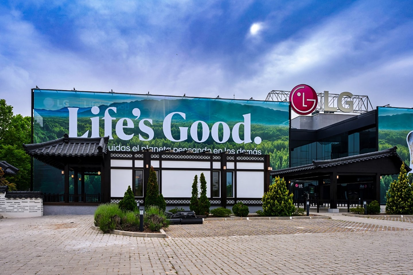 A picture of the outside of 'Another Hanok' and LG's logo