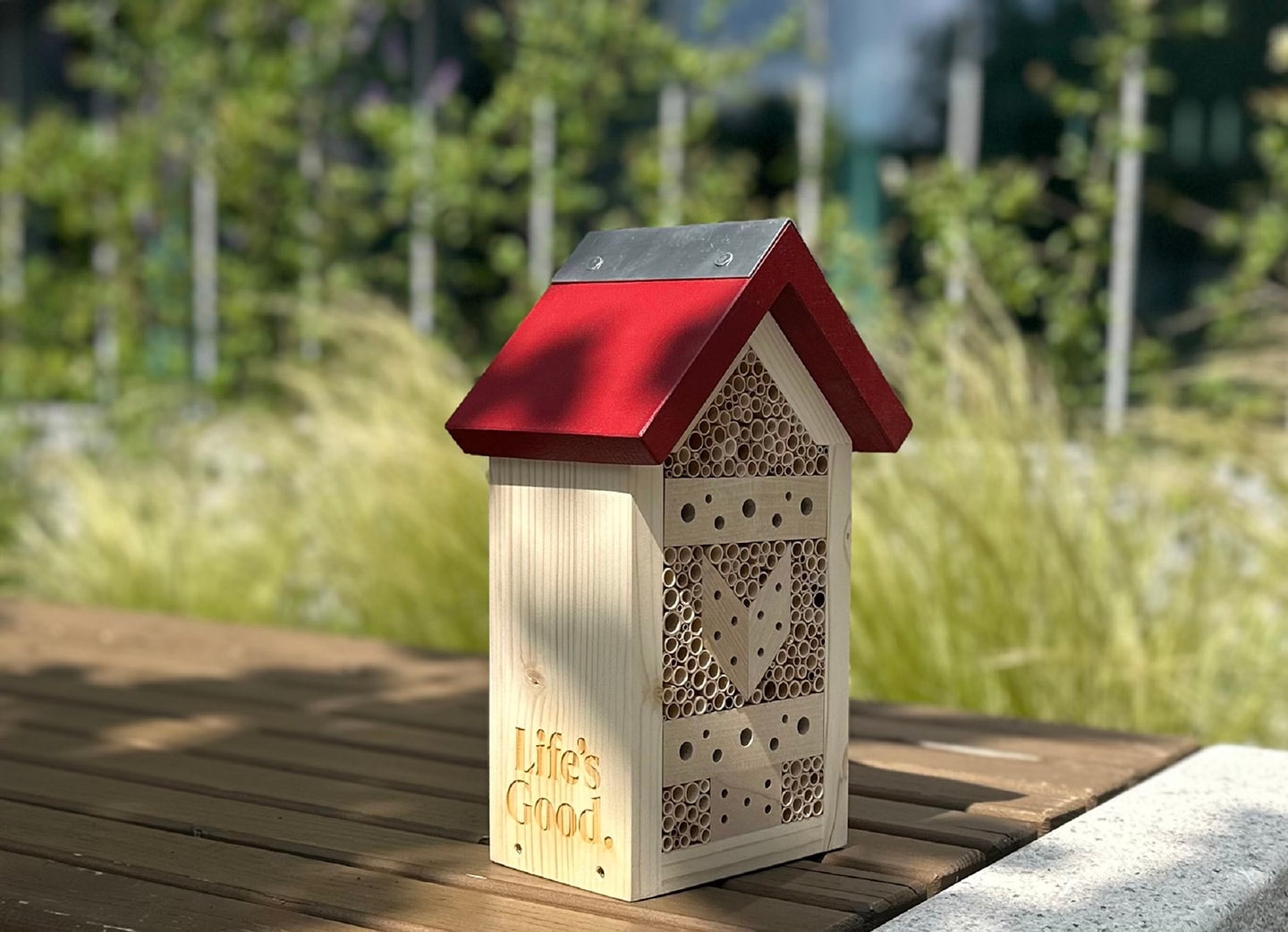 a photo of insect hotel made from sustainable local forestry materials