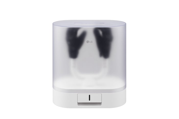 多功能烘乾箱的影像，其蓋子關閉，手套固定在支架上