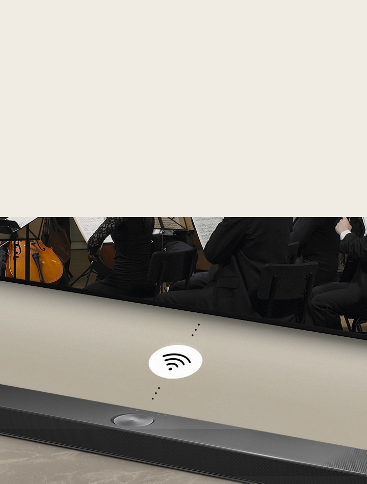 LG 電視下方的 LG Soundbar 特寫。LG Soundbar 和 LG 電視之間有一個連接符號，表示 WOWCAST 的無線操作。