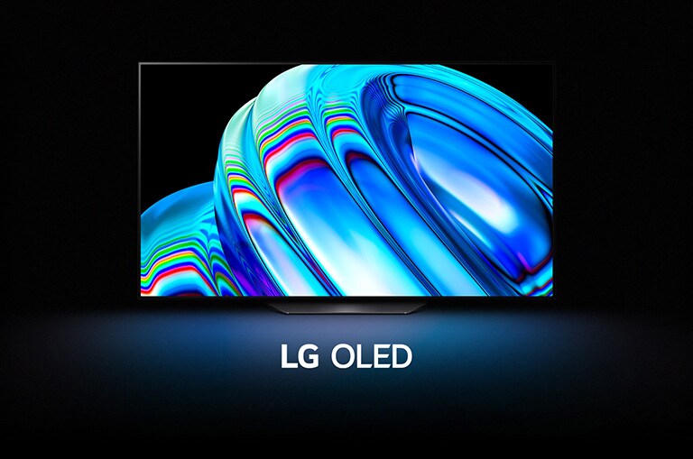 藍色抽象波浪圖案填滿屏幕，然後逐漸縮小，露出 LG OLED B2。 屏幕變黑，然後再次顯示波浪，下方顯示「LG OLED」字樣。