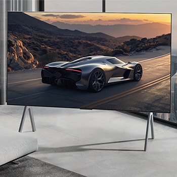 窗外為城市景觀的寬敞客廳。LG OLED 電視被安放在座地架上。超薄機身設計讓螢幕帶來身歷其境般的觀賞體驗。Zero Connect Box 巧妙隱藏其中。