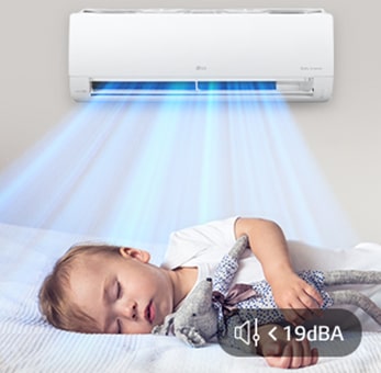 a baby asleep under the air conditioner