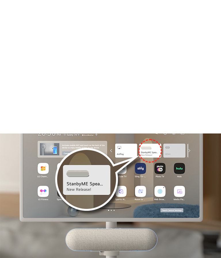 Close-up of the LG StanbyME screen. LG StanbyME Speaker XT7S  is attached at the bottom. The screen shows a home screen with the speaker's exclusive widget highlighted. To highlight the app, an enlarged image of the StanbyME speaker widget is also shown.
