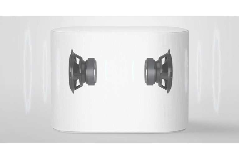 A subwoofer is placed on a white floor. Two components inside the subwoofer are shown.